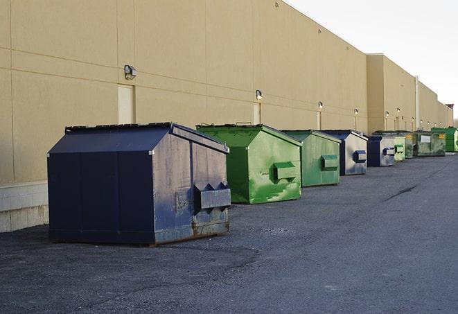 large construction dumpster positioned on a city street in Chester, NJ